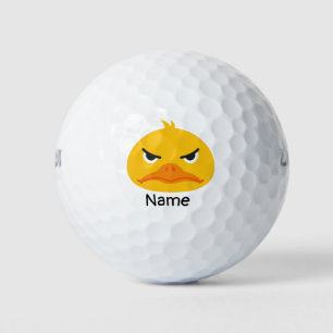 Duck golfer is golfing golf balls