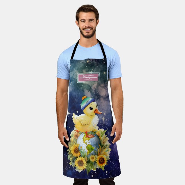 Duck in Gay Flag Colours Beanie Stands on Planet Apron (Worn)