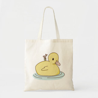 Duck swimming with flowers  tote bag