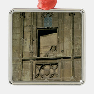 Dummy window in the entrance facade with a figure metal tree decoration