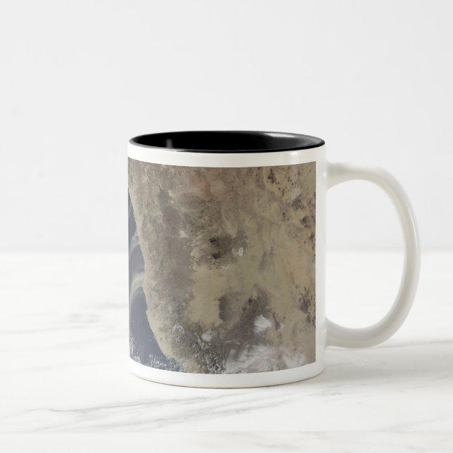 Dust plumes blow off the coast of Saudi Arabia Two-Tone Coffee Mug (Right)