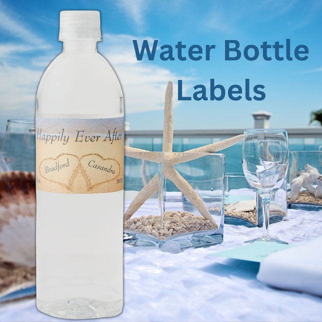 Dusty Blue Beach Wedding 2 Heart Sand Monogram Water Bottle Label (Creator Uploaded)