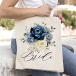 Dusty Blue Champagne Ivory Floral Wedding Bride Tote Bag<br><div class="desc">Dusty blue floral wedding bridesmaid gift totebag featuring elegant bouquet of navy blue, royal blue , white , gold, champagne ivory, blush colour rose , ranunculus flower buds and sage green eucalyptus leaves and elegant watercolor bouquet. Please contact me for any help in customisation or if you need any other...</div>