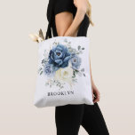 Dusty Blue Navy Champagne Ivory Floral Wedding Tot Tote Bag<br><div class="desc">Dusty blue floral wedding bridesmaid gift bag featuring elegant bouquet of navy blue, royal blue , white , gold, champagne ivory, blush colour rose , ranunculus flower buds and sage green eucalyptus leaves and elegant watercolor bouquet. Please contact me for any help in customisation or if you need any other...</div>