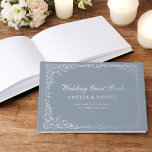 Dusty Blue Silver Floral Vintage Wedding Guest Book<br><div class="desc">Capture memories in timeless elegance with our Vintage Victorian Floral Wedding Foil Guest Book. Featuring intricate floral designs and luxurious foil accents, this guest book exudes classic charm and sophistication. Perfect for preserving heartfelt messages from your loved ones, it blends old-world beauty with modern craftsmanship. The high-quality materials and refined...</div>
