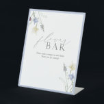 Dusty Blue Wildflower Bridal Shower Flower Bar Pedestal Sign<br><div class="desc">A flower bar is more than a party feature—it’s a memory-maker. This delicately illustrated sign offers graceful guidance for guests as they craft their take-home bouquets. With softly trailing wildflowers and serene dusty blue framing, it blends effortlessly into a refined bridal shower setting—perfect for garden-inspired events, floral workshops, or any...</div>