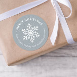 Dusty Blue Winter Snowflake Christmas Gift Tag<br><div class="desc">Affordable custom printed Merry Christmas round gift tag stickers personalised with your text. This simple modern holiday design features a white snowflake on a light blue grey background. Use the design tools to choose any background colour, edit text fonts and colours or upload your own photos to design your own...</div>