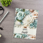 Dusty green cream florals name script planner<br><div class="desc">A dusty green and cream coloured flower pattern.  Personalise and add a year (any year) and your name. The name is written with a modern hand lettered style script</div>