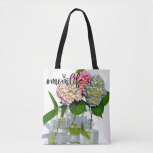 Dusty pink blue yellow green floral hydrangeas tote bag