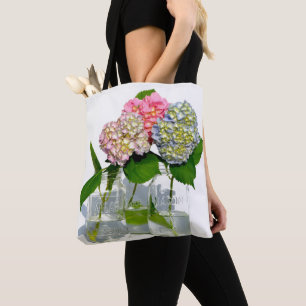 Dusty pink blue yellow green floral hydrangeas  tote bag