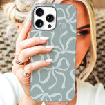 Dusty Sage Bow Monogram iPhone 16 Pro Max Case<br><div class="desc">Dress up your phone in style with this chic and trendy dusty sage phone case! Featuring a playful pattern of hand-drawn bows and personalised with your monogram, this case is the perfect blend of fashion and function. Made from durable materials to protect your phone from everyday bumps and scratches. A...</div>