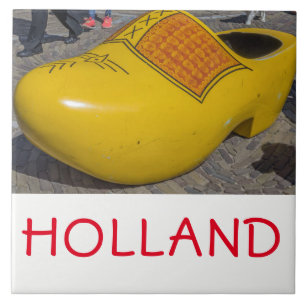 Dutch wooden clog up close ceramic tile