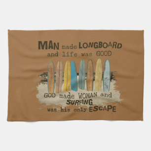 Early Man and Woman Surfing Humour with Longboards Tea Towel