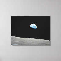 Earth Rising Above The Lunar Horizon.