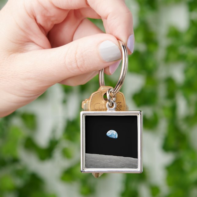 Earth Rising Above The Lunar Horizon. Key Ring (Hand)
