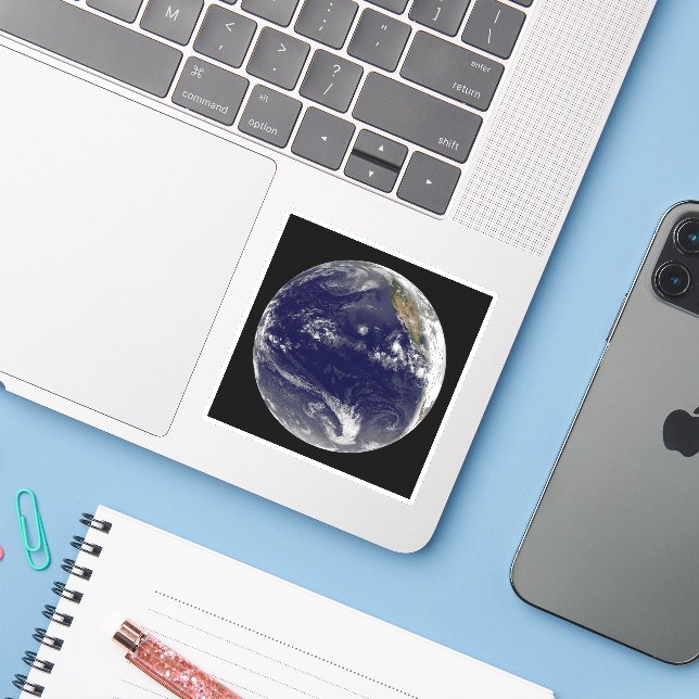 Earth With Three Tropical Cyclones In The Pacific. (Laptop w/ iPhone)