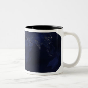 EarthÃ¯Â¿Â½s human-generated nighttime light Two-Tone Coffee Mug