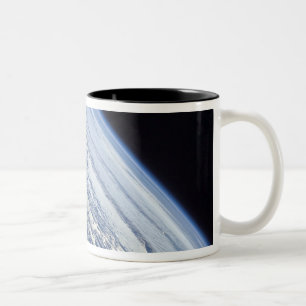 Earth's horizon against the blackness of space Two-Tone coffee mug
