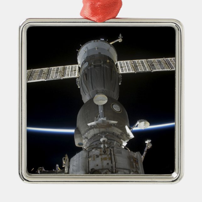 Earth's limb intersects a Soyuz spacecraft Metal Tree Decoration (Front)