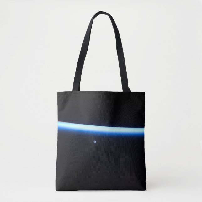 Earth's Thin Line Of Atmosphere And A Gibbous Moon Tote Bag (Front)
