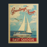 East Quogue Postcard Sailboat Vintage New York<br><div class="desc">This Greetings From East Quogue New York vintage travel nautical design features a boat sailing on the water with seagulls and a blue sky filled with gorgeous puffy white clouds.</div>