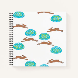 easter bunny and eggs on white notebook