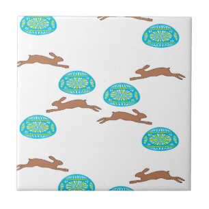 easter bunny and eggs on white tile