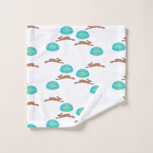 easter bunny and eggs on white wash cloth