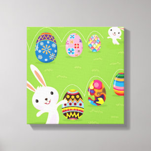 Easter bunny playful with painted eggs canvas print