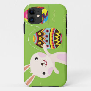 Easter bunny playful with painted eggs iPhone 11 case