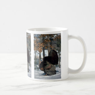 Eastern wild turkey, big gobbler strutting in snow coffee mug
