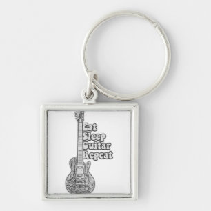 Eat sleep guitar repeat. vintage black and white key ring