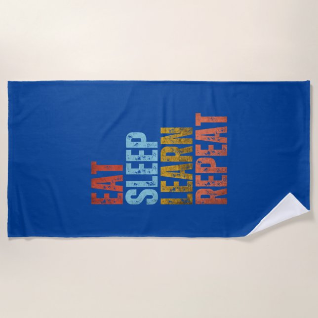 EAT SLEEP LEARN REPEAT BEACH TOWEL (Front)