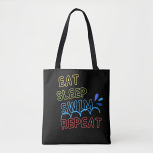Eat sleep swim repeat tote bag