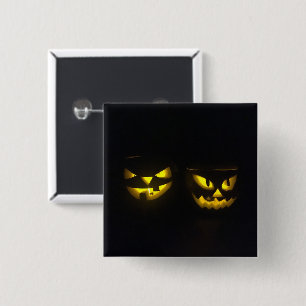 Eeire yellow glow on black creepy pumpkin faces 15 cm square badge