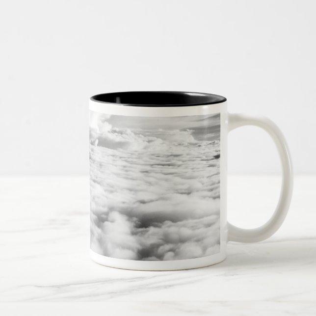 Eerie cloudscape at sunrise. 2 Two-Tone coffee mug (Right)
