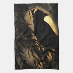 Eerie Raven Silhouette Against A Glowing Moon Tea Towel