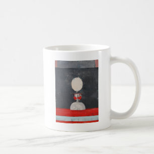 Egg over red and black coffee mug