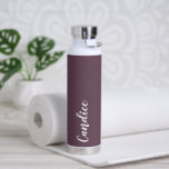 Eggplant Personalised Wedding Bridesmaid Water Bottle<br><div class="desc">Gift your wedding bridesmaid or maid of honour with this trendy, vacuum Insulated water bottle that features her name in white, stylised script on an eggplant colour background designed to match your wedding colour scheme. Personalise bottle by editing and replacing name with your own as desired. Select your water bottle...</div>