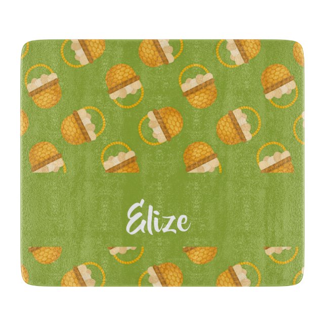 Eggs in brown basket on green cutting board (Front)