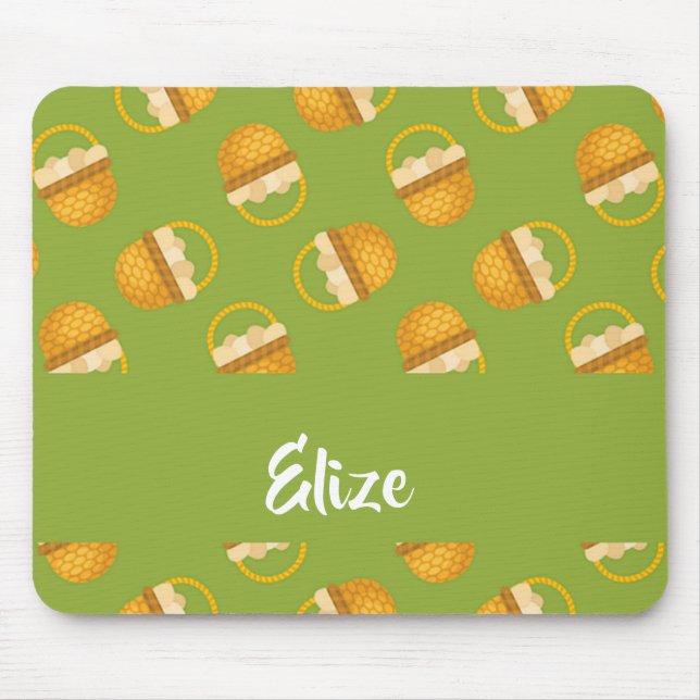 Eggs in brown basket on green mouse mat (Front)