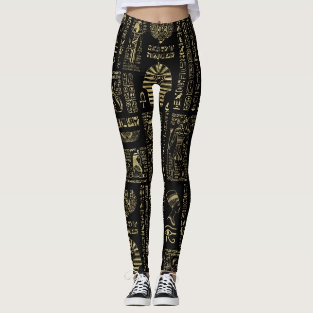 Egyptian hieroglyphs and deities gold on black leggings (Front)