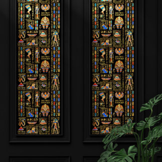 Egyptian hieroglyphs and deities on black wallpaper