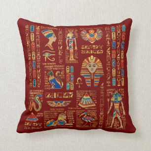 Egyptian hieroglyphs and deities on red cushion
