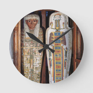 Egyptian sarcophagus covered with hieroglyphics (p round clock