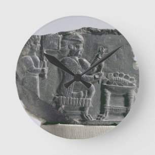 Elamite woman spinning, Neo-Elamite Period, c.700- Round Clock