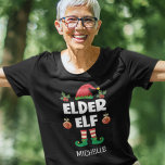 Elder elf fun ironic Christmas family outfit name T-Shirt<br><div class="desc">This amusing self-ironic elder elf t-shirt, which is a part of a matching family elf clothing collection with gifts for every family member, will help you get into the holiday mood. Perfect for any Christmas family gathering, this t-shirt features a cute elf hat and fun legs, with the caption "Elder...</div>