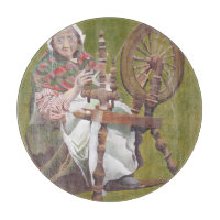 Elderly Irish Woman Crafter At A Spinning Wheel