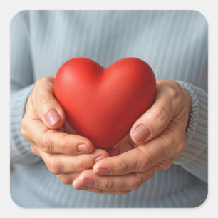 Elderly Woman Holding a Red Heart Square Sticker
