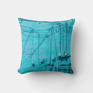 ELECTRIC METER ON BLUE BRICK WALL CUSHION